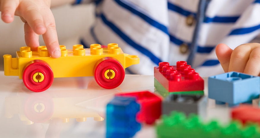LEGO Storytelling child playing with LEGO