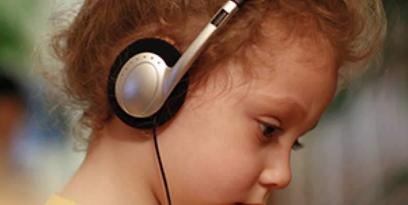 Freegal Music Young girl listening to headphones