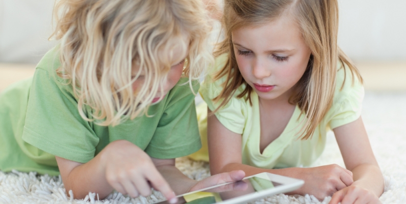 Hoopla Little girls using a tablet