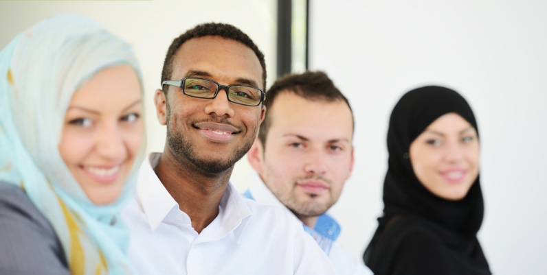 Services for Newcomers Group of people smiling