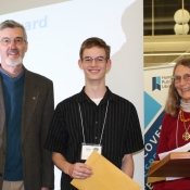 photo of a teenage boy who have received an award from two adults