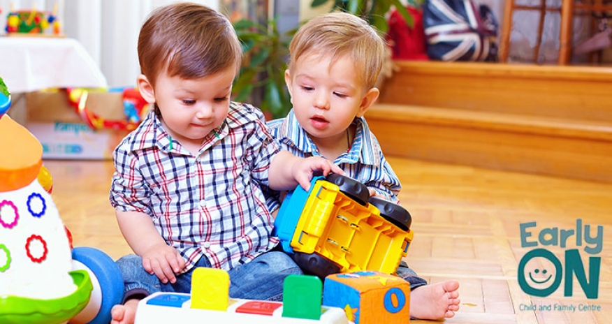 Stay and Play Drop In with EarlyON two toddlers playing